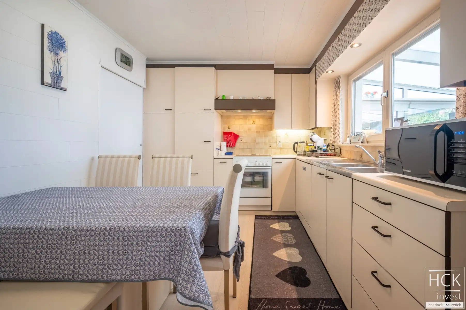 KRUISHOUTEM - Ruime halfopen woning met 4 SLPK, op een aantrekkelijk perceel van 402 m²! foto 9
