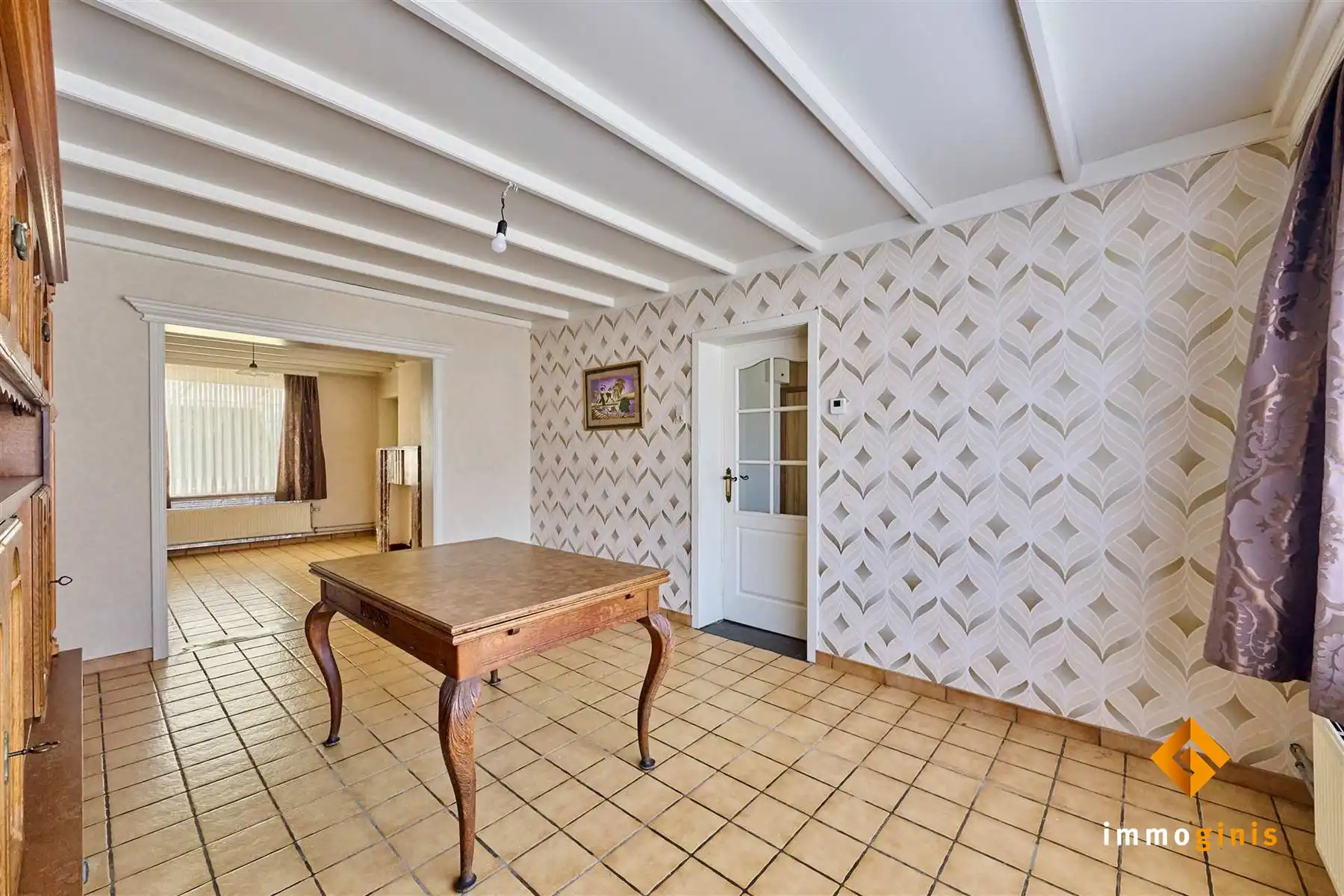 Verrassend ruime, te renoveren woning met 3 slaapkamers en uitbreidingsmogelijkheden op zolder! foto 3