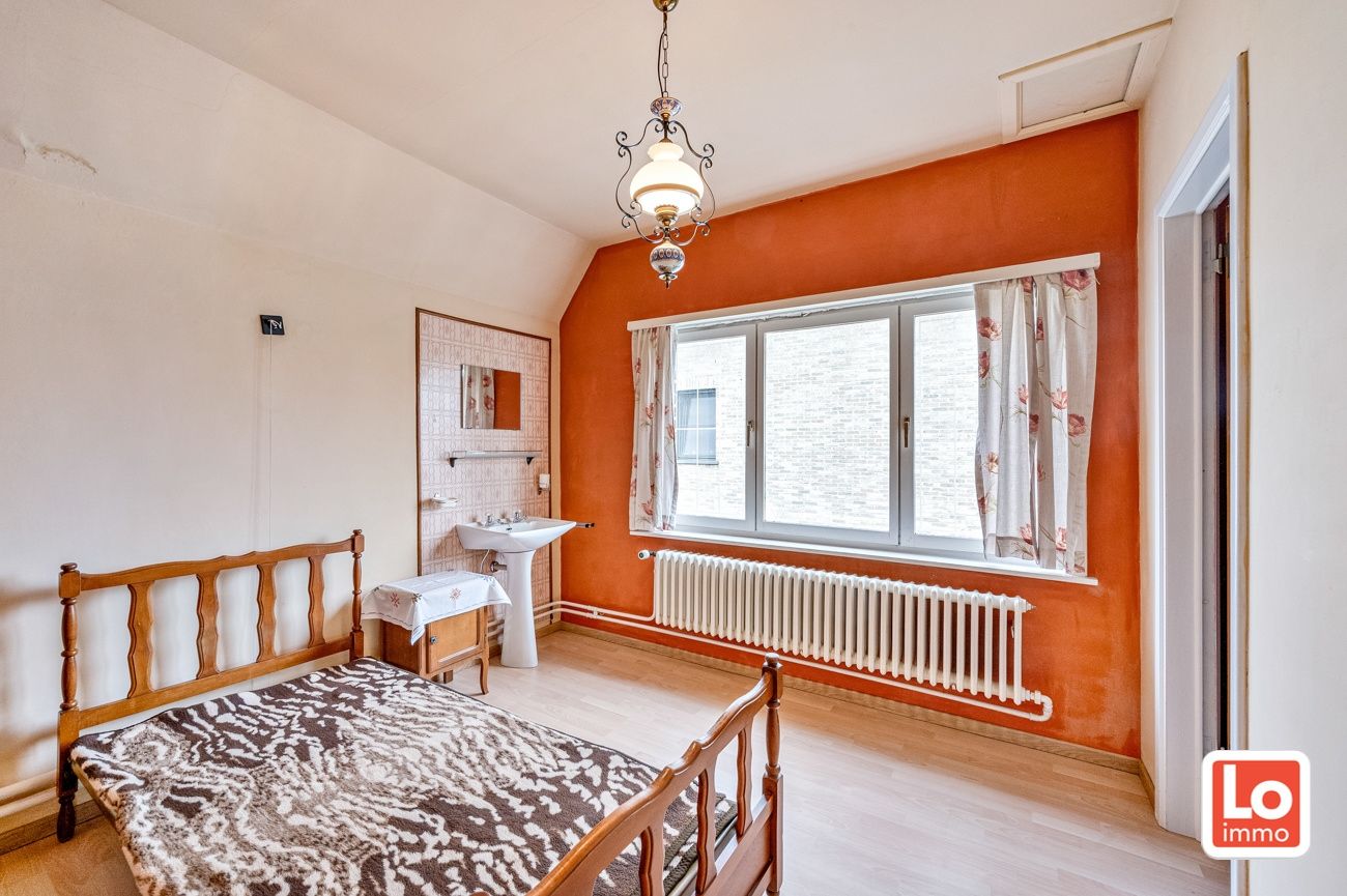 Leuke open te renoveren woning met garage op een mooi perceel en gelegen op een goed bereikbare locatie tussen Lochristi en Oostakker. foto 14