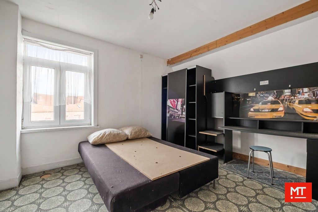 Te renoveren alleenstaande woning in de dorpskern van Wulvergem (Heuvelland) foto 8