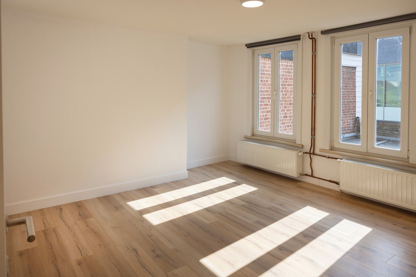 Opbrengsteigendom met handelsgelijkvloers & 2 appartementen. foto 14