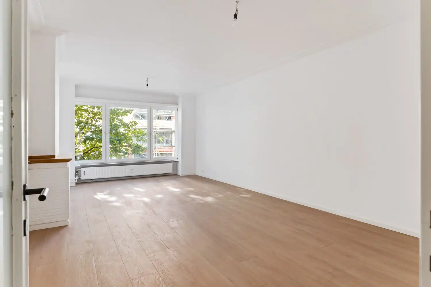 Licht en ruimte in het hart van Antwerpen – 1 slaapkamer appartement foto 3