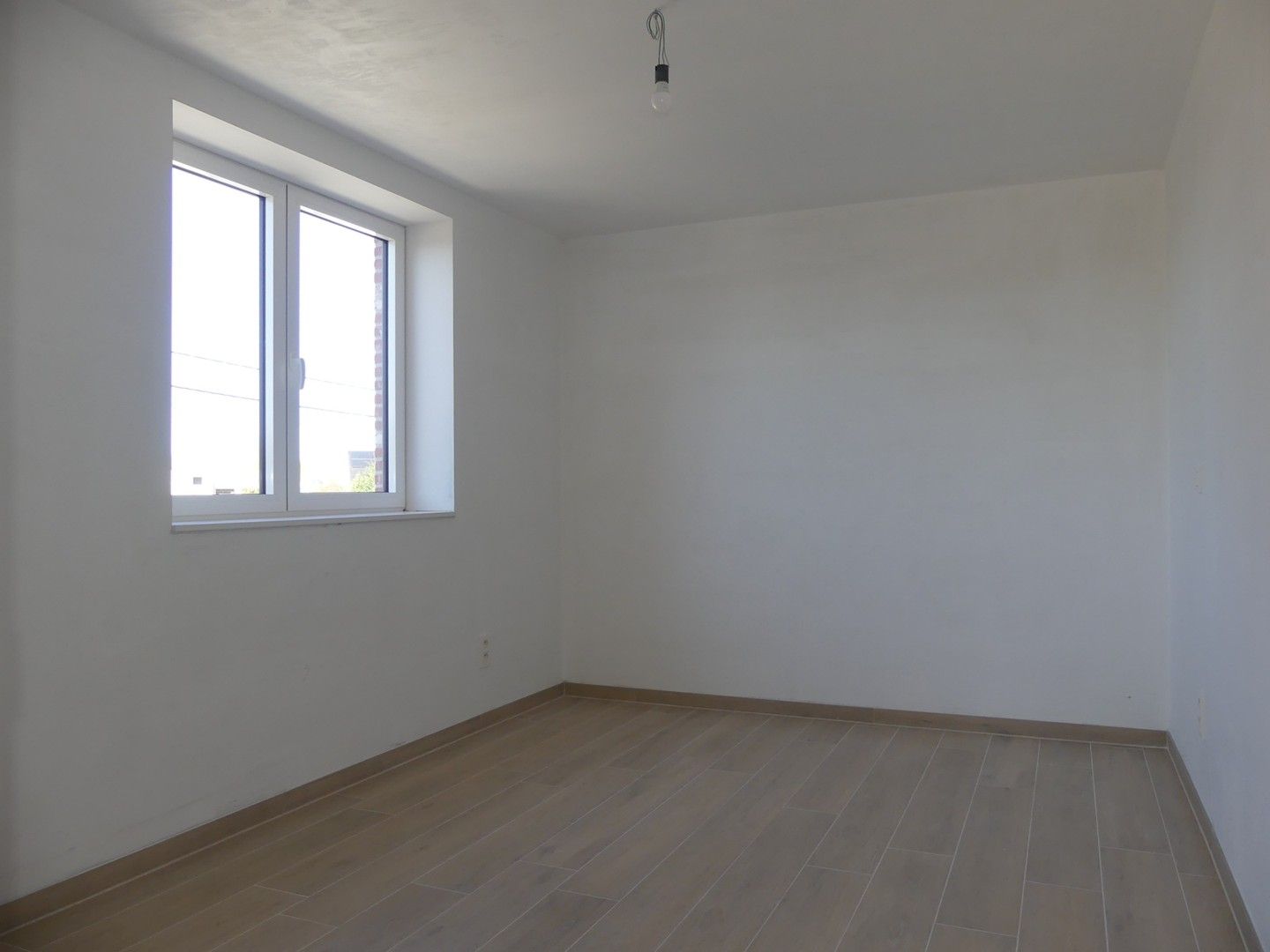 Halfopen nieuwbouwwoning met zuidgericht terras, tuin en garage foto 10