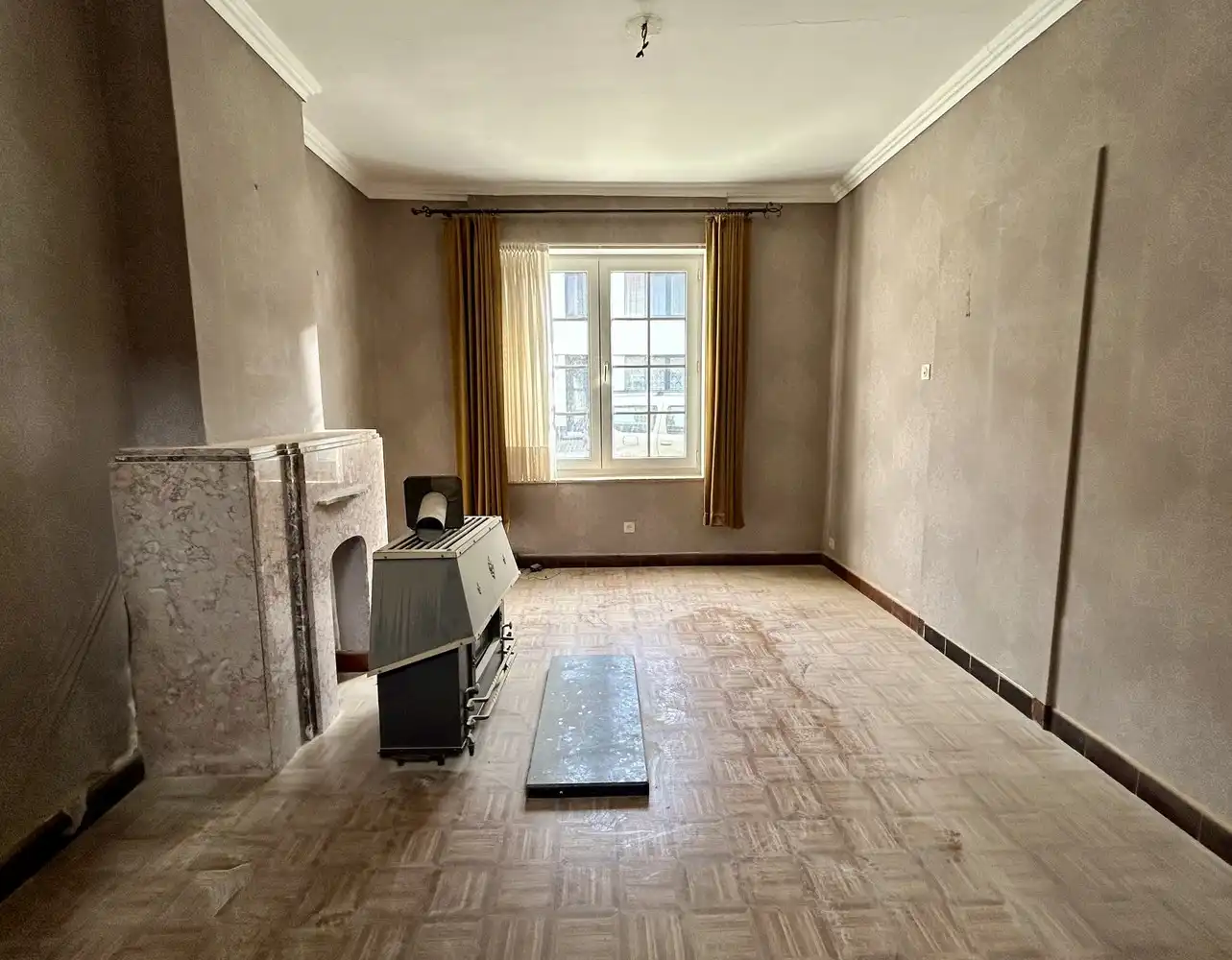 Volledig te renoveren rijwoning met veel potentieel op toplocatie in Kessel-Lo foto 4