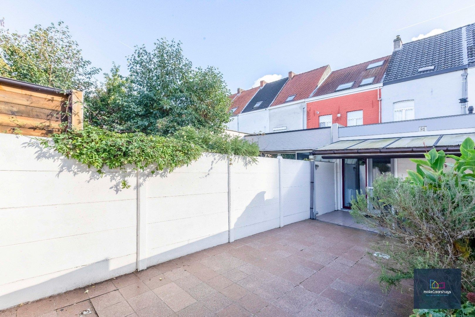 Charmante op te frissen rijwoning met ruime stadstuin  foto 19