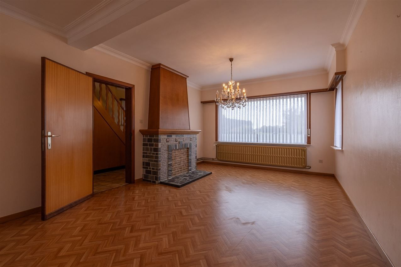 Temidden van agrarisch gebied, grenzend aan bos foto 39