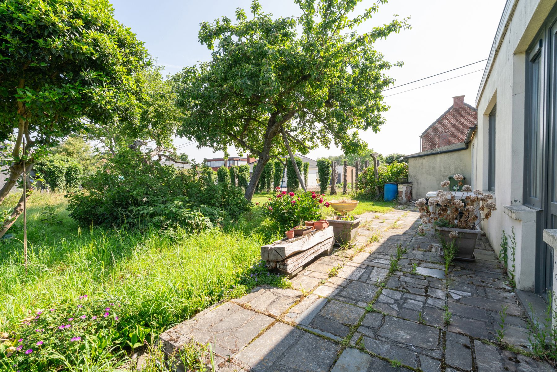 Te renoveren woning met 4 slaapkamers en mooie tuin in het rustige Haaltert foto 19