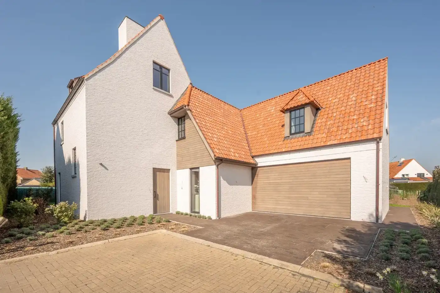 Alleenstaande nieuwbouwvilla met aangename volumes foto 7