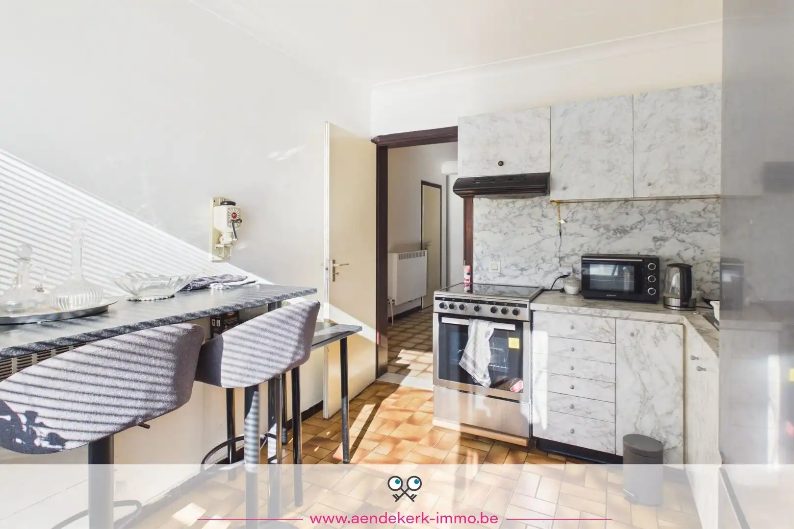 Ruim gelijkvloers appartement met 3 slaapkamers, garage en kelderberging foto 8