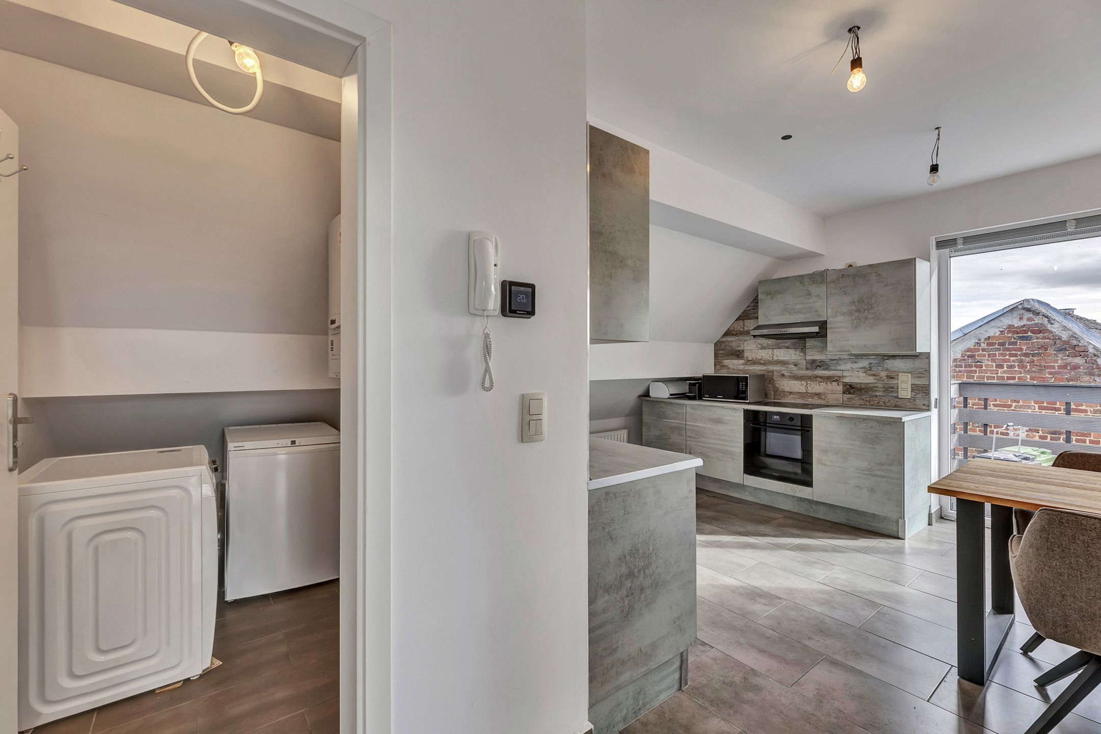 Dakappartement met terras en 2 autostaanplaatsen foto 9