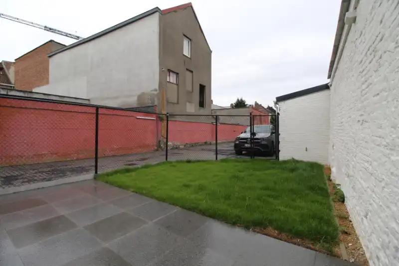 Gelijkvloers nieuwbouw appartement met zonnige tuin te Gent foto 8