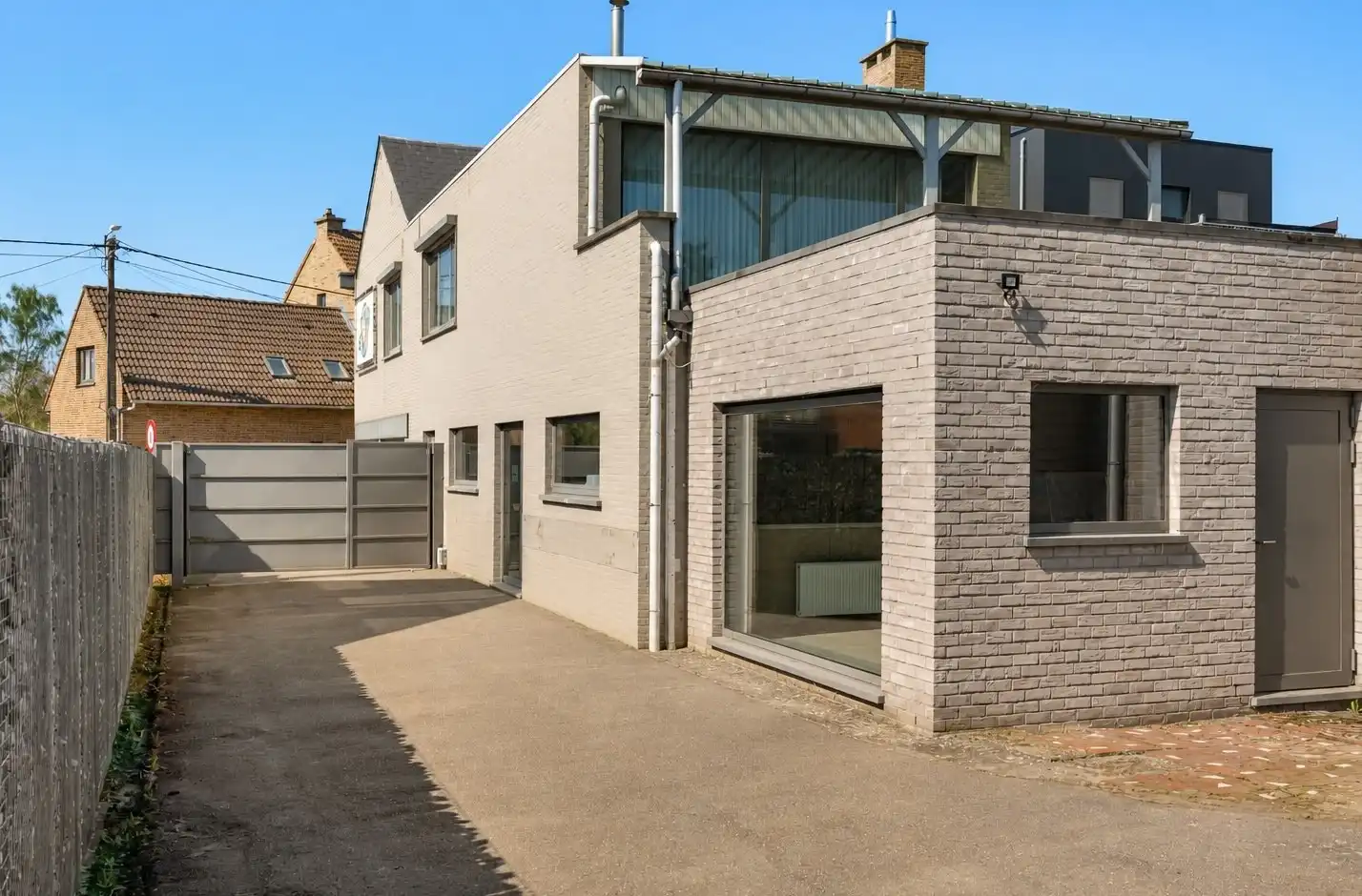 Commercieel pand met ruime handelsruimte, loods én drie-slaapkamer appartement van 160 m² in Wezemaal ! foto 15