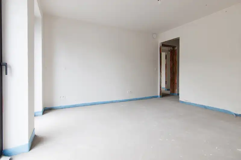 Ruim gelijkvloers nieuwbouwappartement met 4 slaapkamers en 2 badkamers, ruim terras en een mooie tuin op een goed bereikbare locatie! foto 10