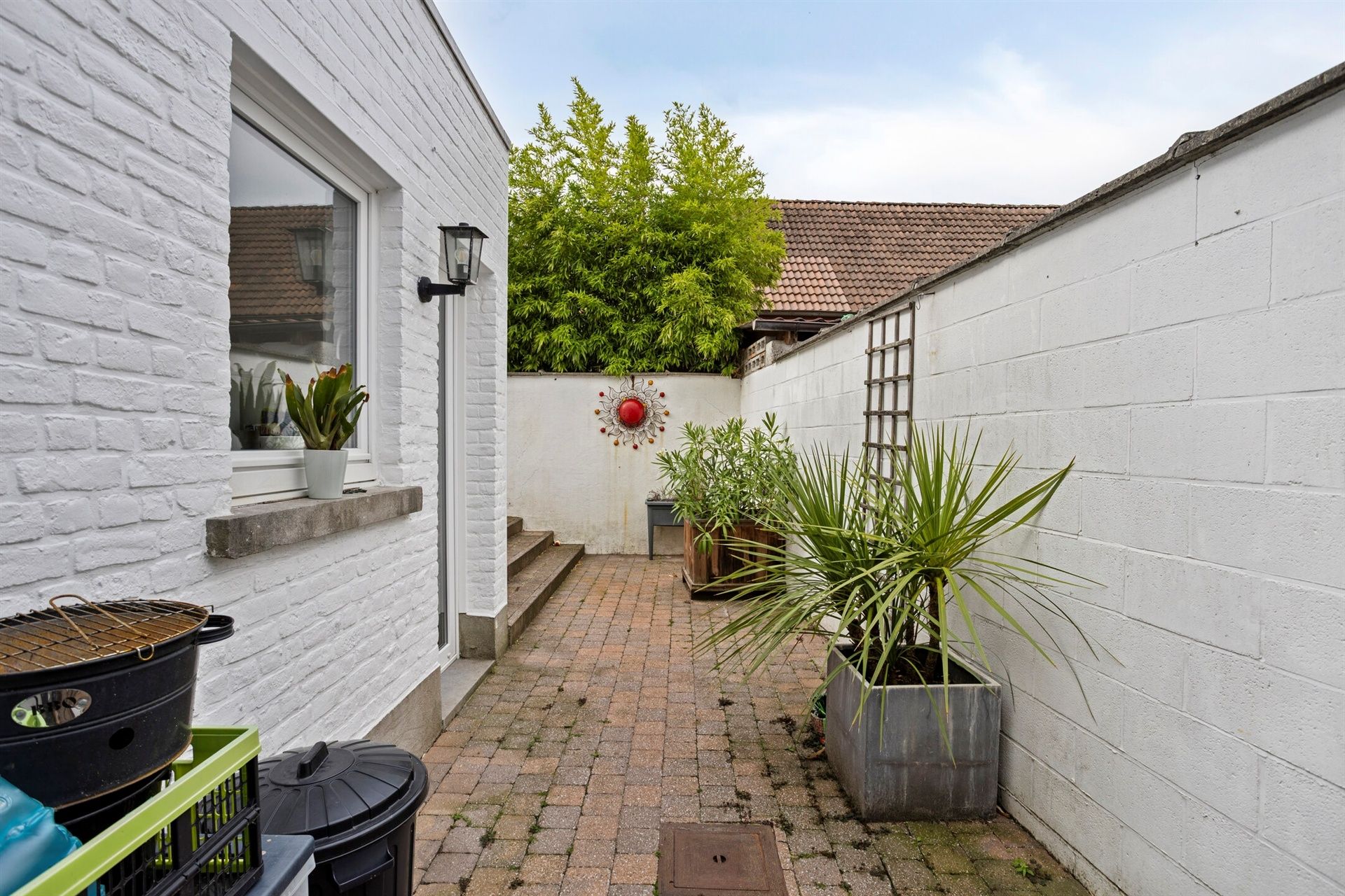 Instapklare rijwoning met stadskoer in hartje Merchtem foto 22