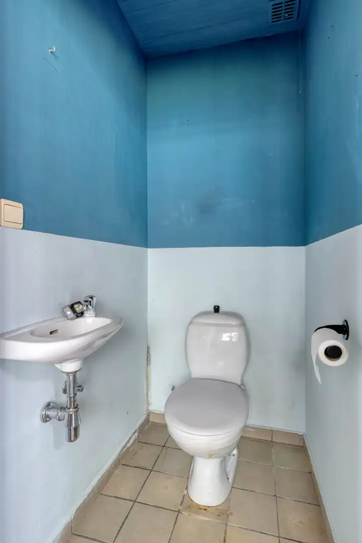 Op te knappen woning in het centrum van Mol met parkeerplaats !  foto 14