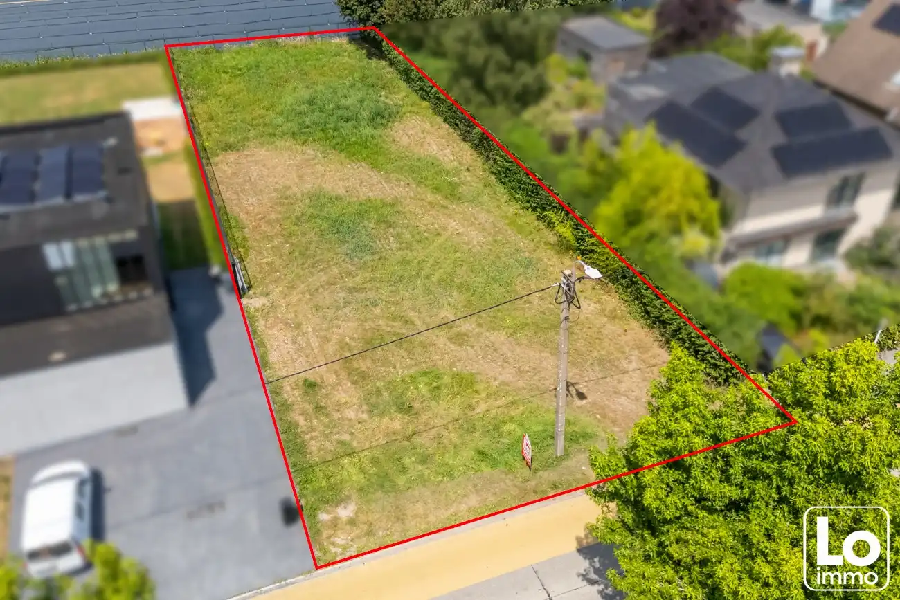 Mooie bouwgrond voor een open woning op wandelafstand van het centrum van Lochristi! foto {{pictureIndex}}