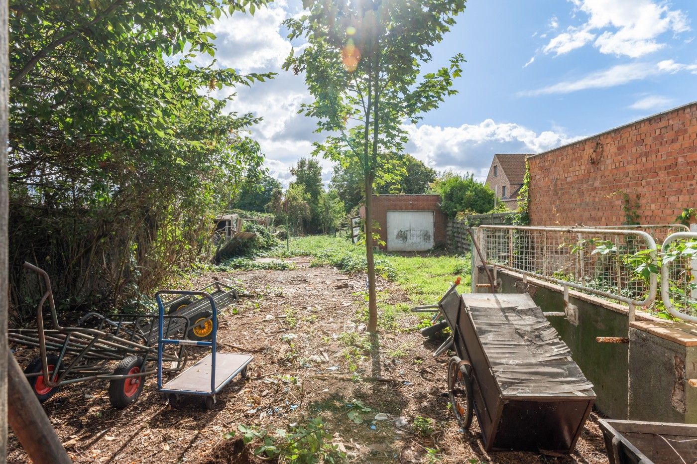 Te renoveren woning met 2 slpk., garage en grote tuin foto 15