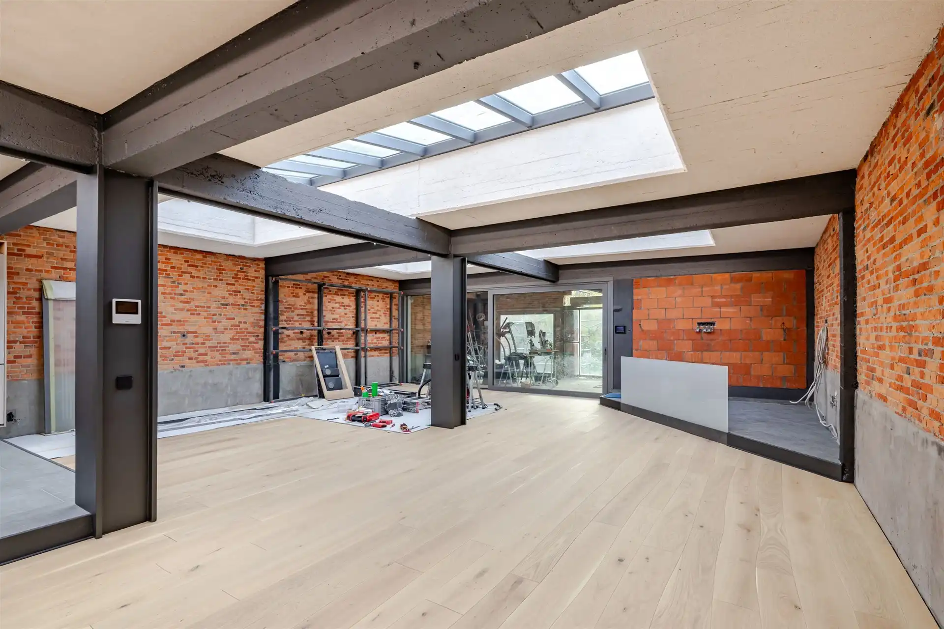 Unieke loft (290m²) met atelier, studio, tuin én magazijn (200m²) foto 2