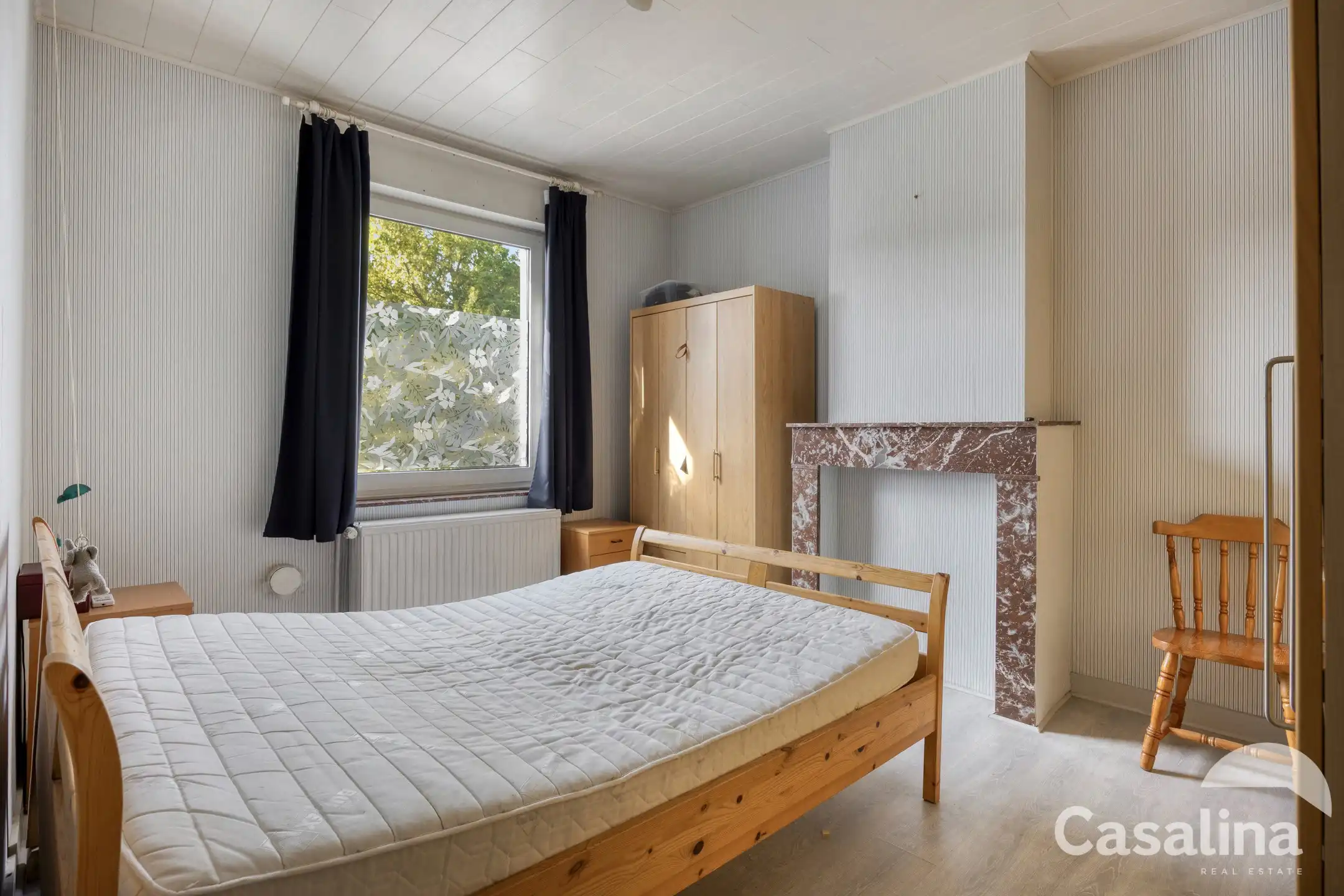 Bel-etagewoning met garage en tuin om op te frissen foto 11