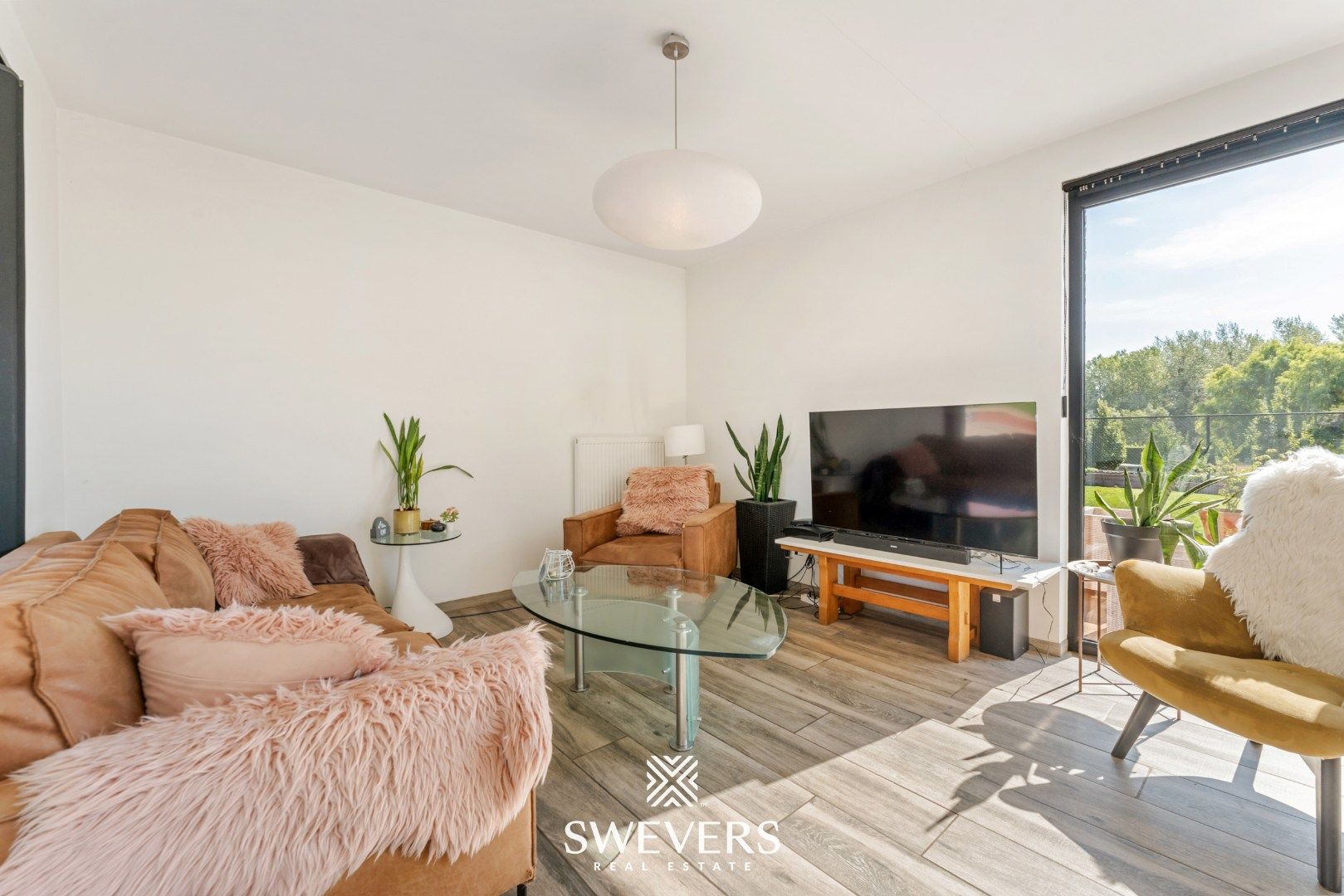 Recente, instapklare en energiezuinige woning op rustige straat te Kortessem foto 2