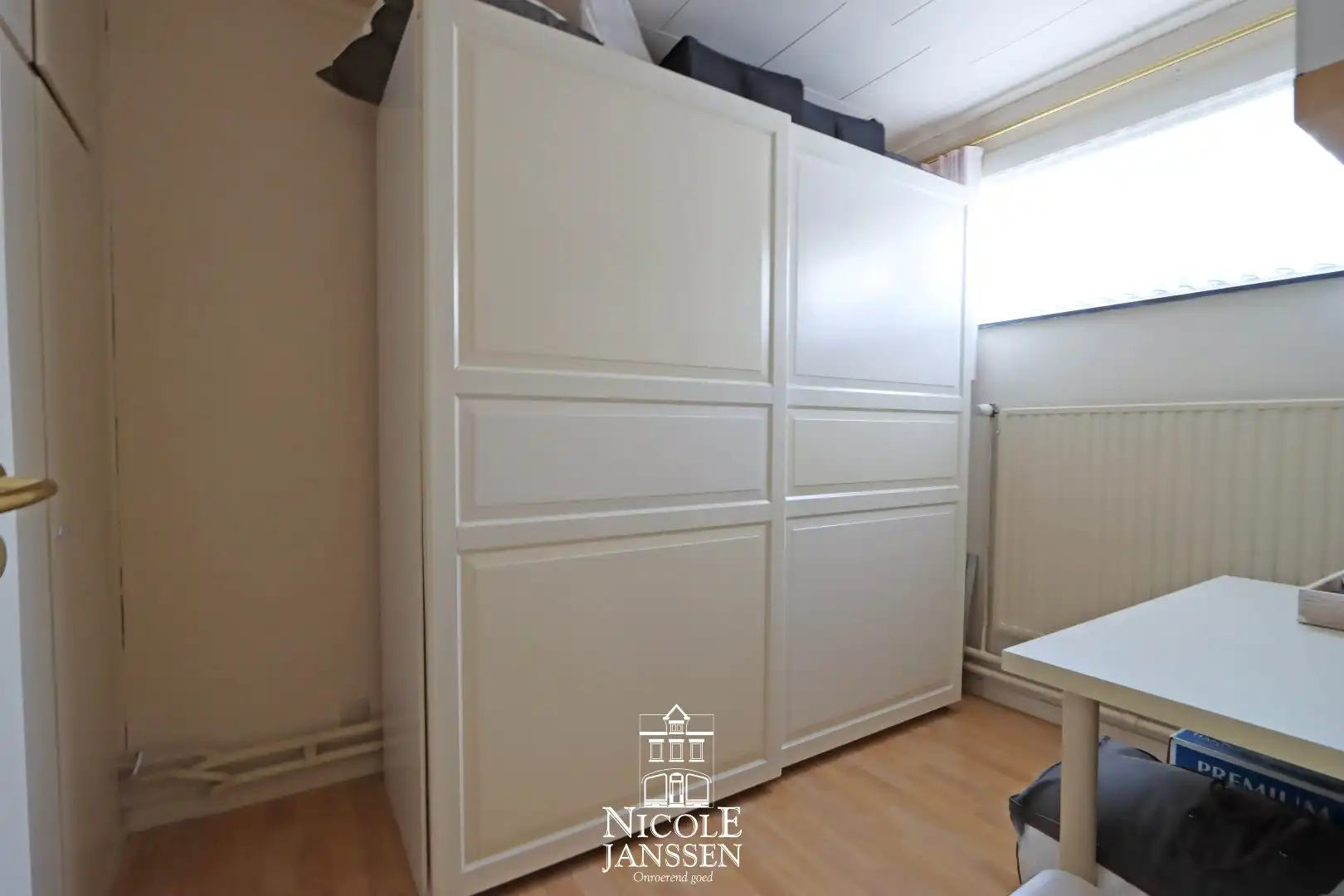 Halfopen gezinswoning met 4 slaapkamers, garage en tuintje foto 23