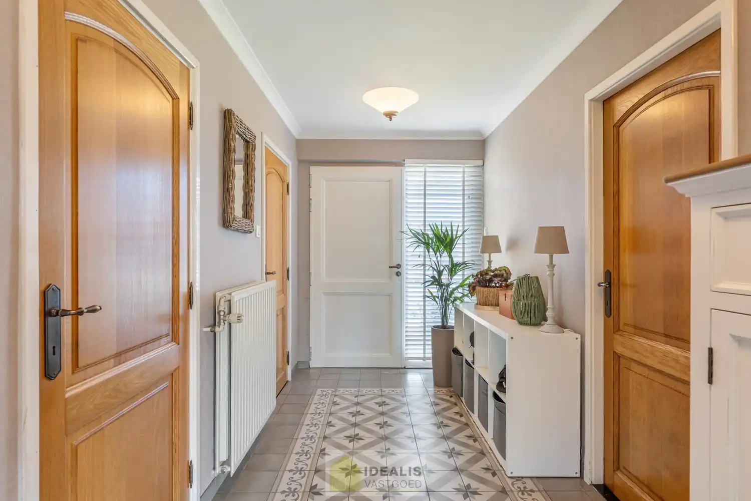 IDEALIS VASTGOED – Goed onderhouden en aangename gelijkvloerse woning met 2 slaapkamers op een prachtig, ruim en uiterst breed perceel foto 6