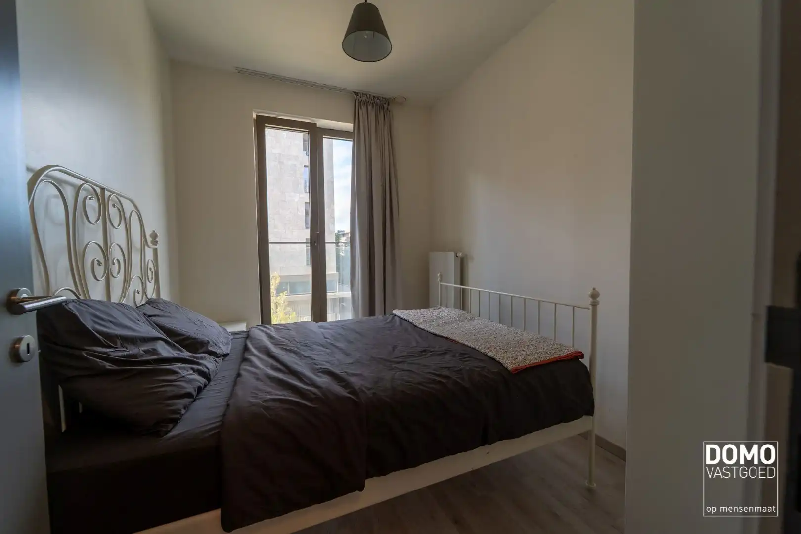 APPARTEMENT MET PRACHTIG TERRAS, 2 SLAAPKAMERS EN AUTOSTANDPLAATS TE KOOP AAN QUARTIER BLUE, HASSELT foto 8