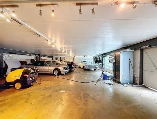 Toonzaal met 2 aparte werkplaatsen/garages te Opwijk foto 4