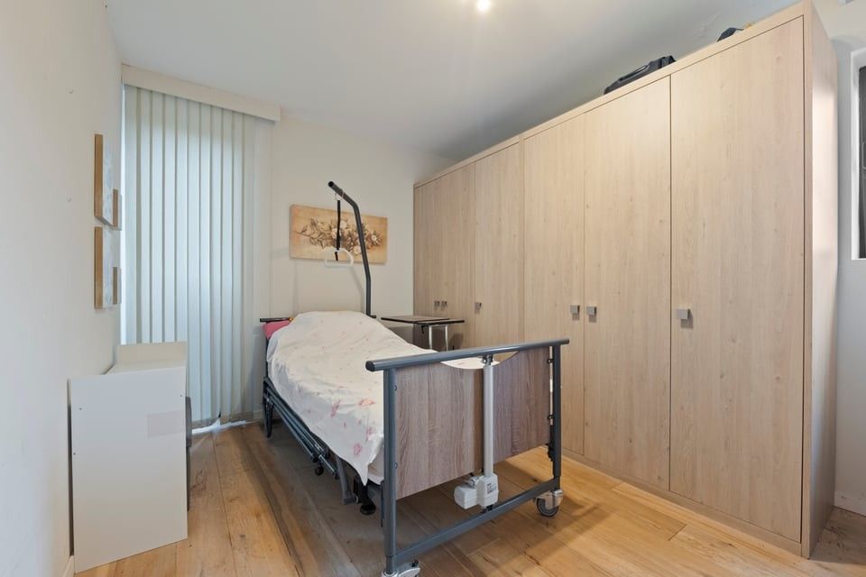 MODERN GELIJKVLOERS APPARTEMENT MET TERRAS EN STAANPLAATS IN SINT-TRUIDEN foto 19