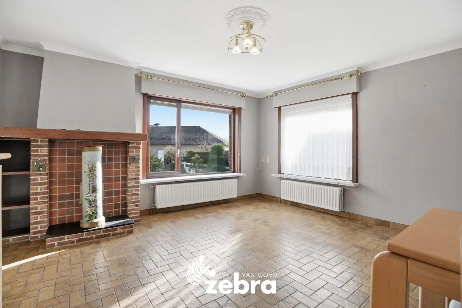 Op te frissen open bebouwing met zonnige tuin in Moorslede! foto 6