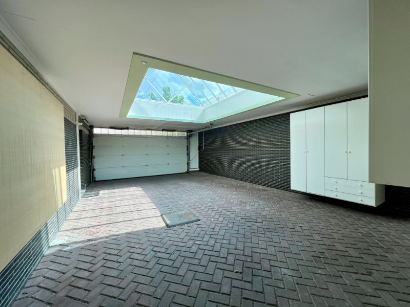 MULTIFUNCTIONEEL PAND MET DUPLEXAPPARTEMENT EN GARAGE foto 8