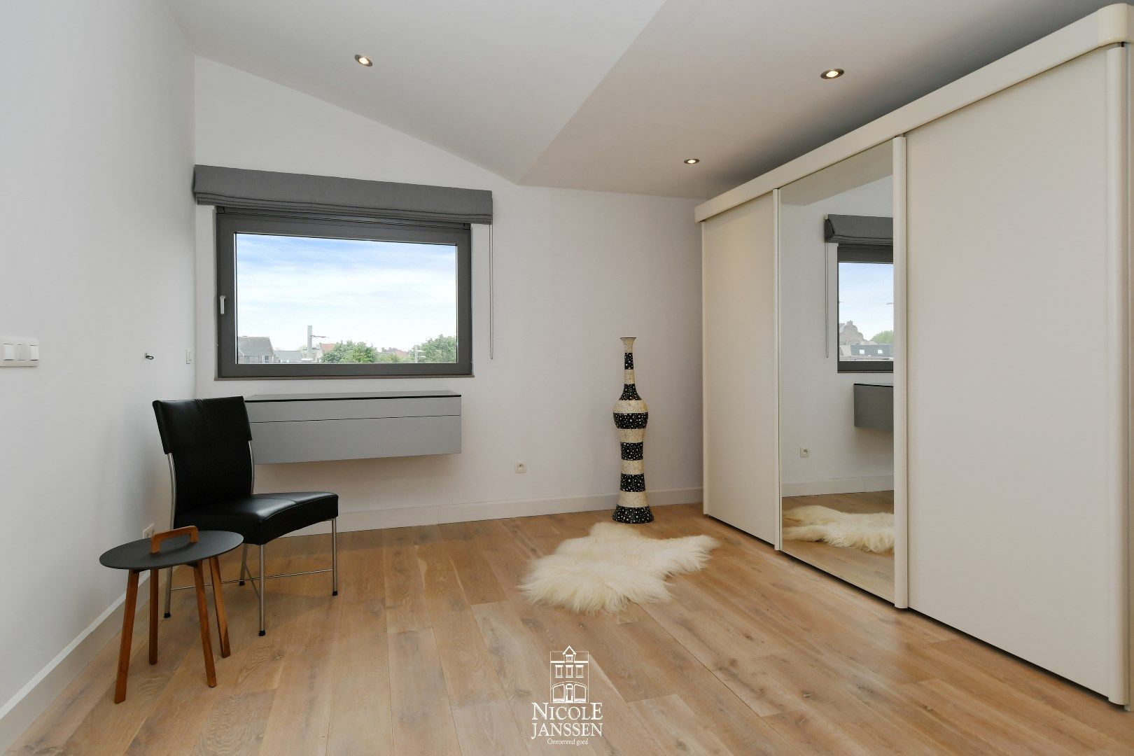 Appartement met kelderberging en twee autostandplaatsen te koop in Maaseik foto 28