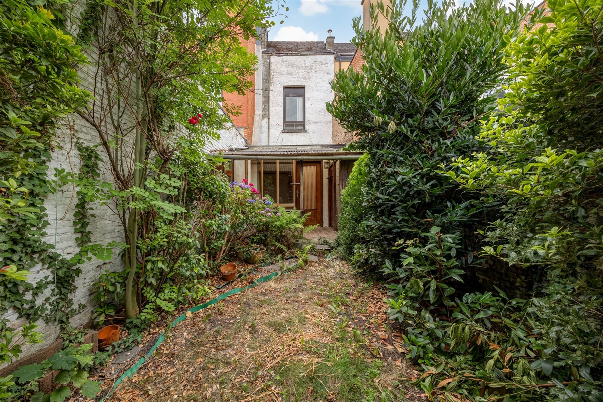 Te renoveren woning met tuin op toplocatie in Mechelen foto 22