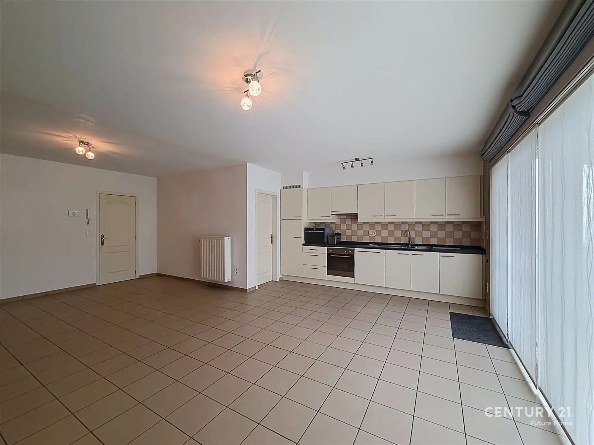 Gelijkvloers appartement met overdekt terras en tuin! foto 4