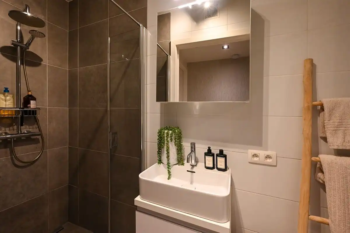 Instapklaar gelijkvloersappartement met heerlijke stadstuin foto 20