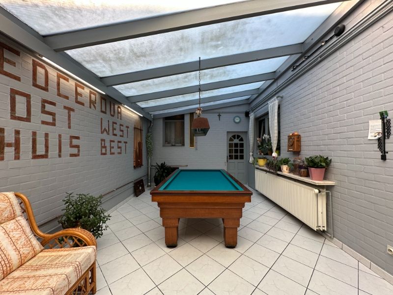 Ruime gezinswoning met grote tuin, veranda en veel opbergruimte foto 7