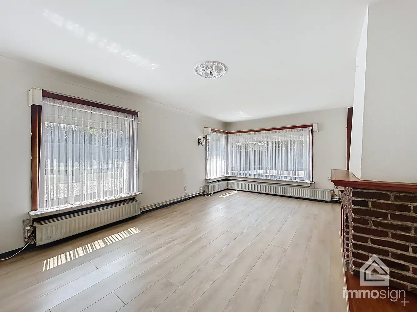 Charmante gezinswoning met potentieel op ruim hoekperceel in hartje Eksel foto 4