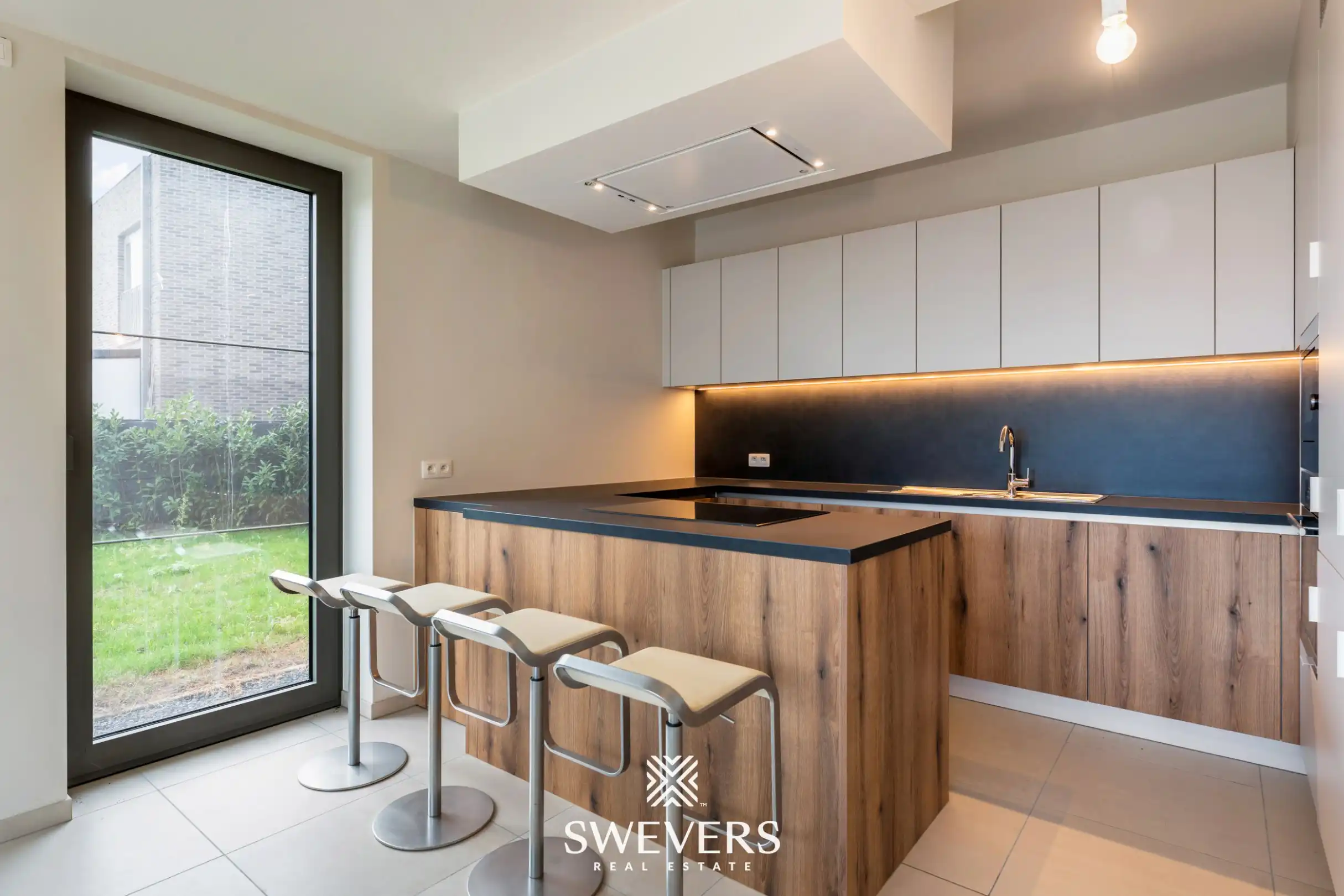 Stijlvol, gelijkvloers en instapklaar appartement (208 m²) mét private tuin en private kelder vlakbij Zolder-centrum foto 9