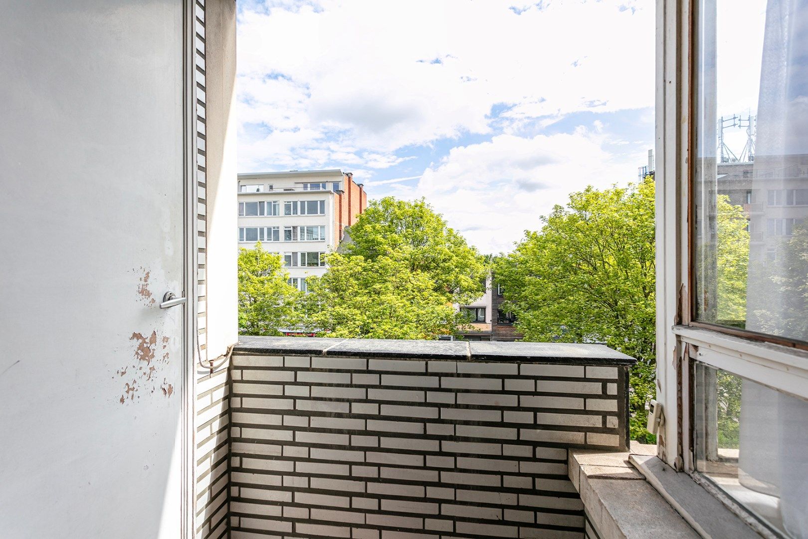 Te renoveren 2-slaapkamer appartement (107m²) met twee terrassen! foto 7