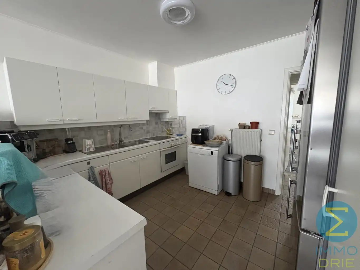 Opbrengsteigendom met 3 verhuurde appartementen en garages foto 17