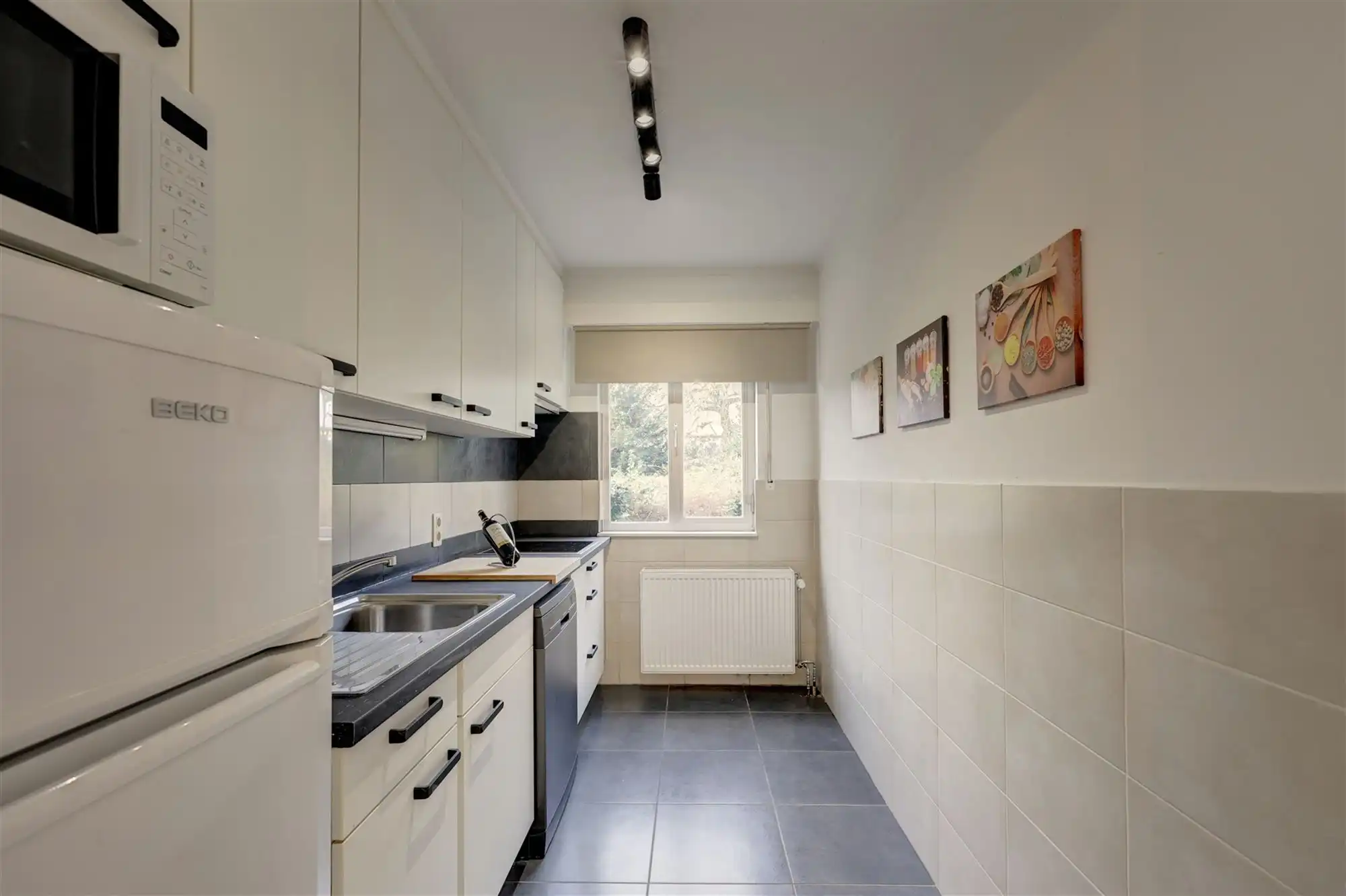 Gelijkvloers appartement met 4 slaapkamers en tuin in centrum Wilrijk foto 3