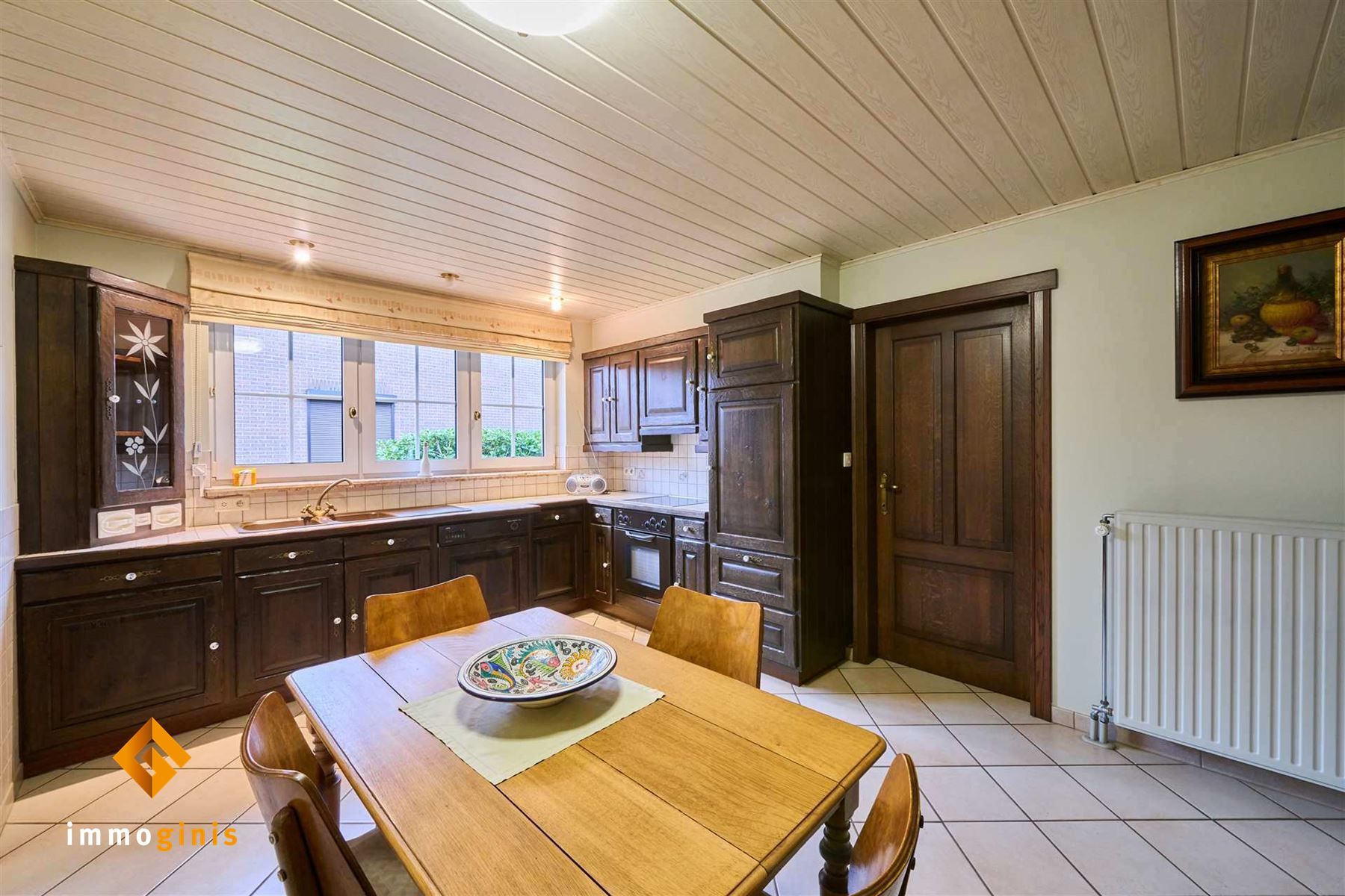 Zeer goed onderhouden woning met 2 slpks (+ mog. tot 2 à 3 extra kamers), overdekt terras en mooie tuin! foto 4