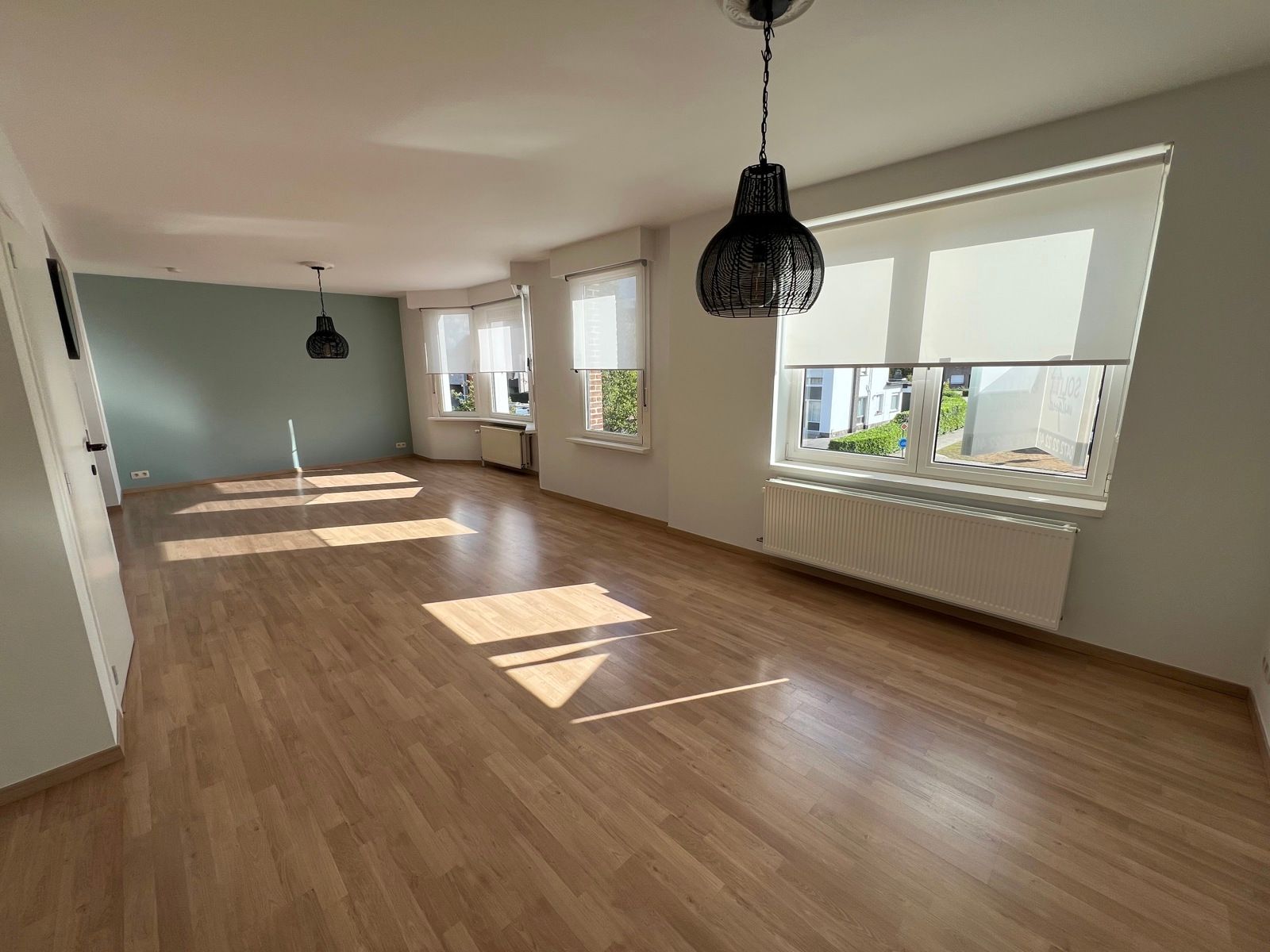 Duplex in kleinschalig gebouw met 2 slpk en terras foto {{pictureIndex}}