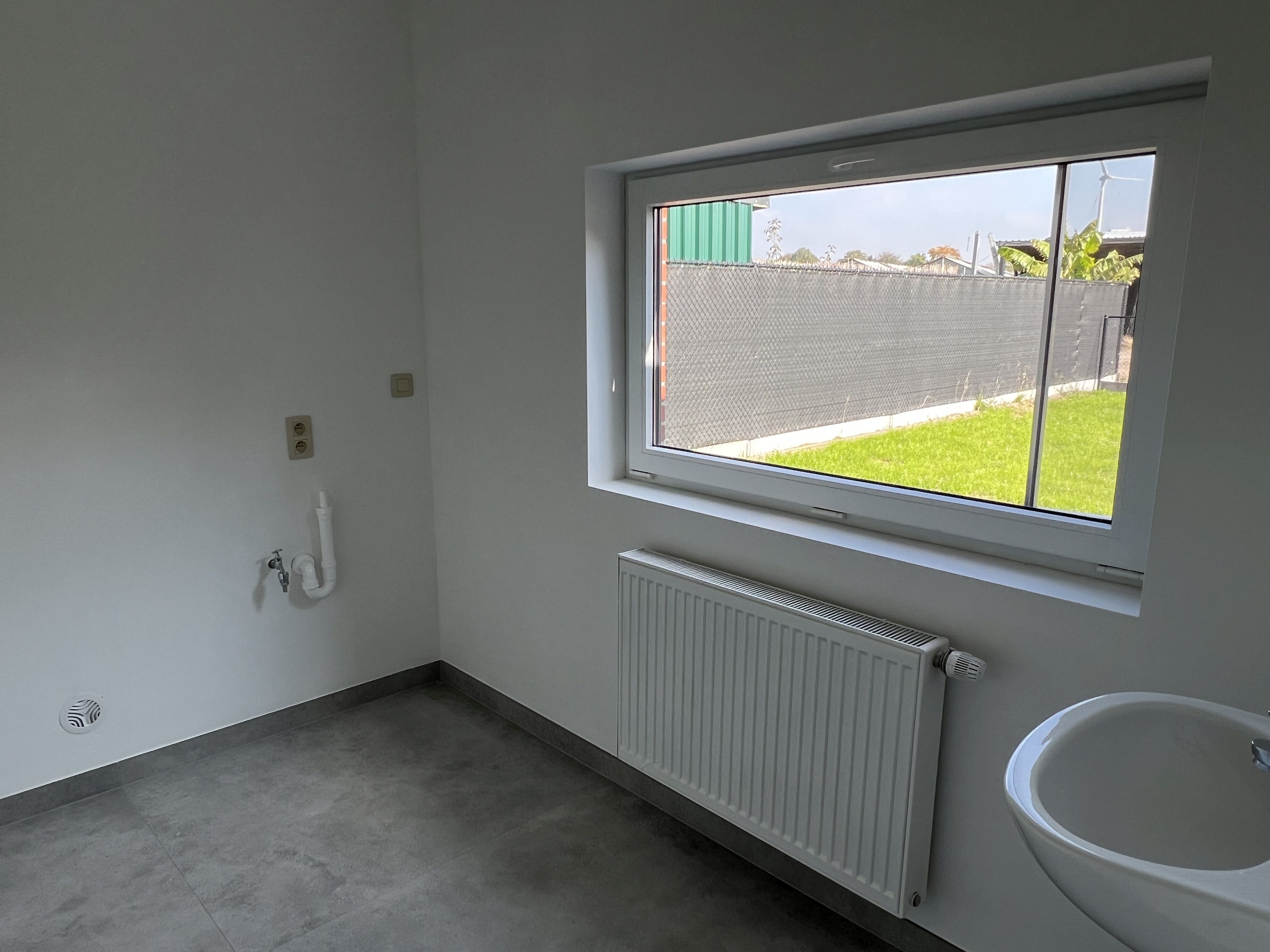 Volledig gerenoveerde energiezuinige driegevelwoning met 4 slaapkamers en tuin. foto 10
