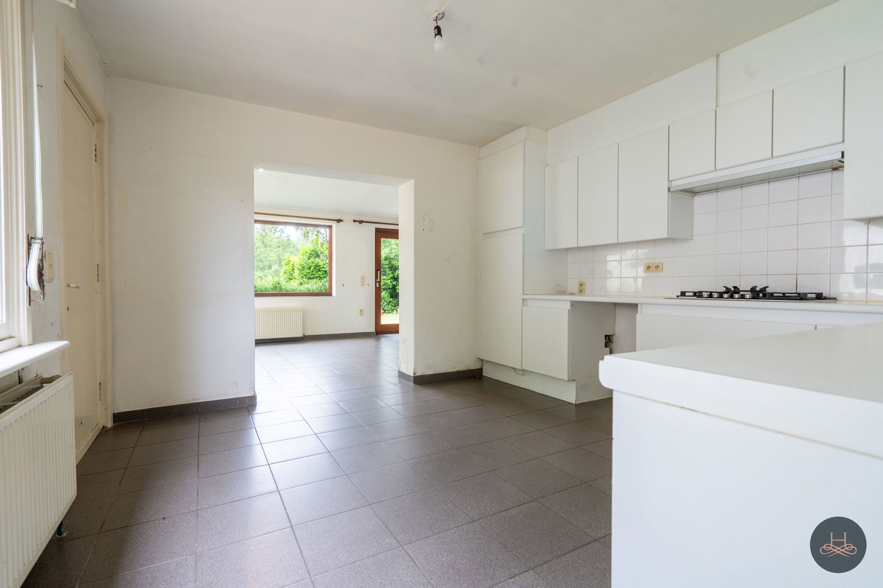 Achterliggende gezinswoning op rustgevend perceel foto 10