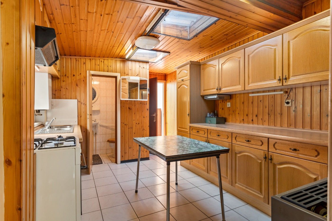 Tof gelegen, te renoveren woning met 2 slpk., garage en tuin foto 4