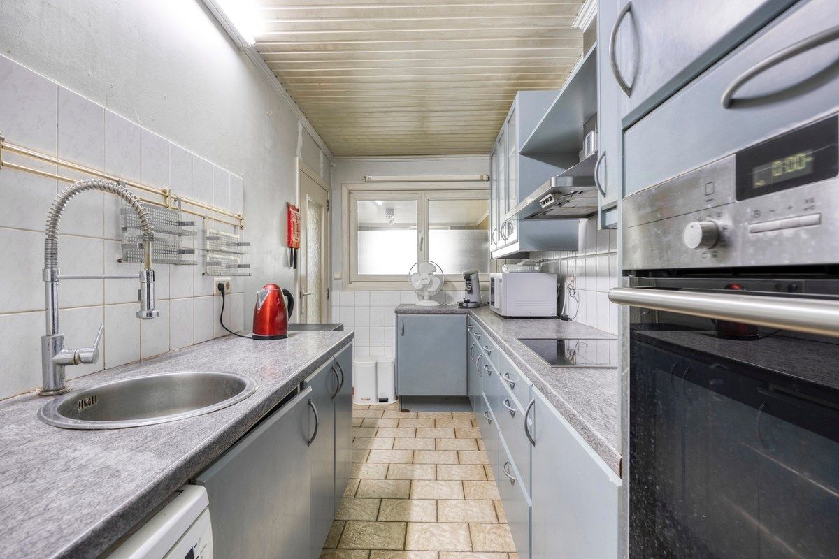 Karaktervolle woning met tuin en parking aan achterzijde - aan het stadscentrum van Tongeren foto 11