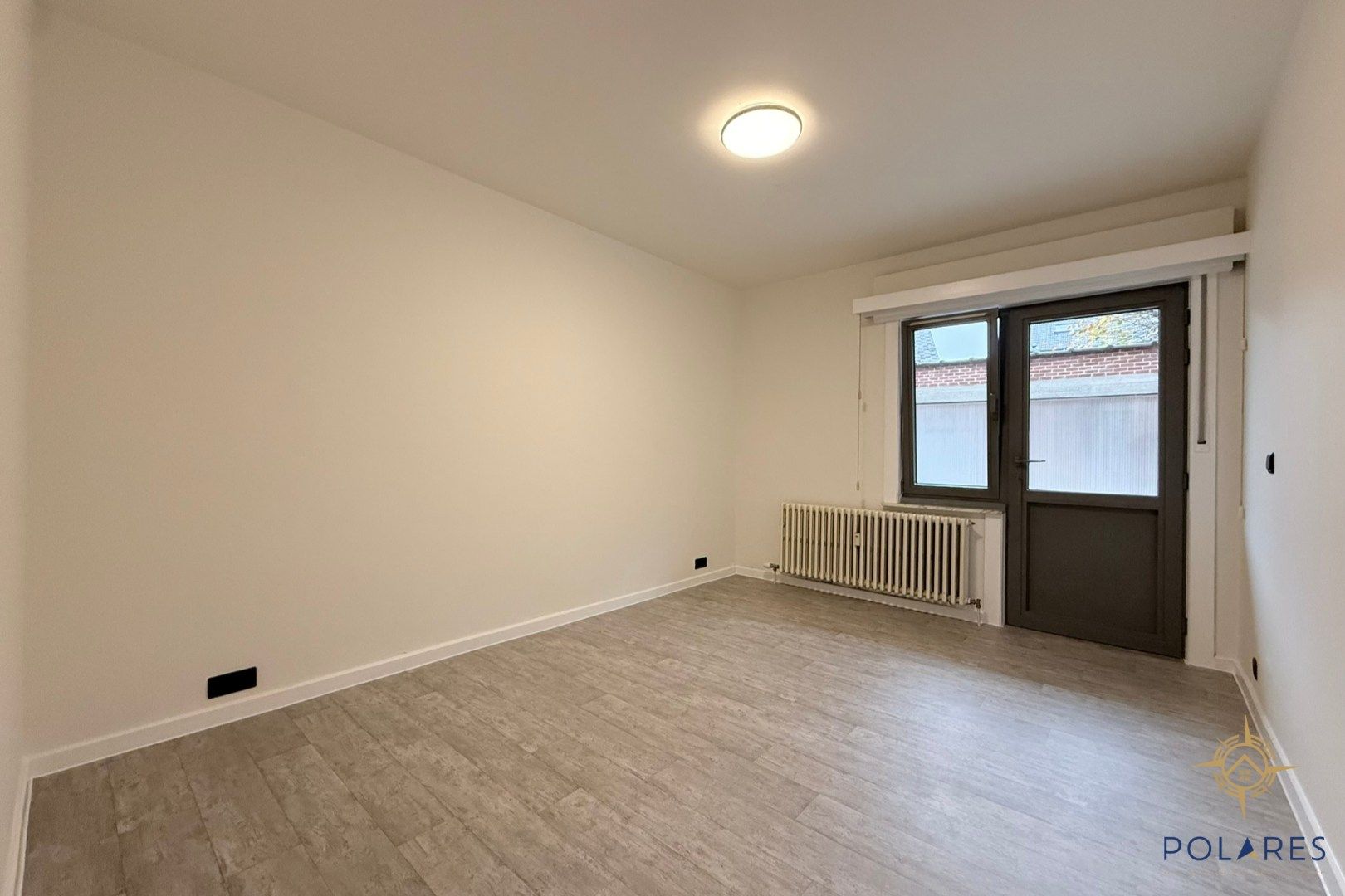 Ruim gelijkvloers appartement in het hartje van Herent foto 12