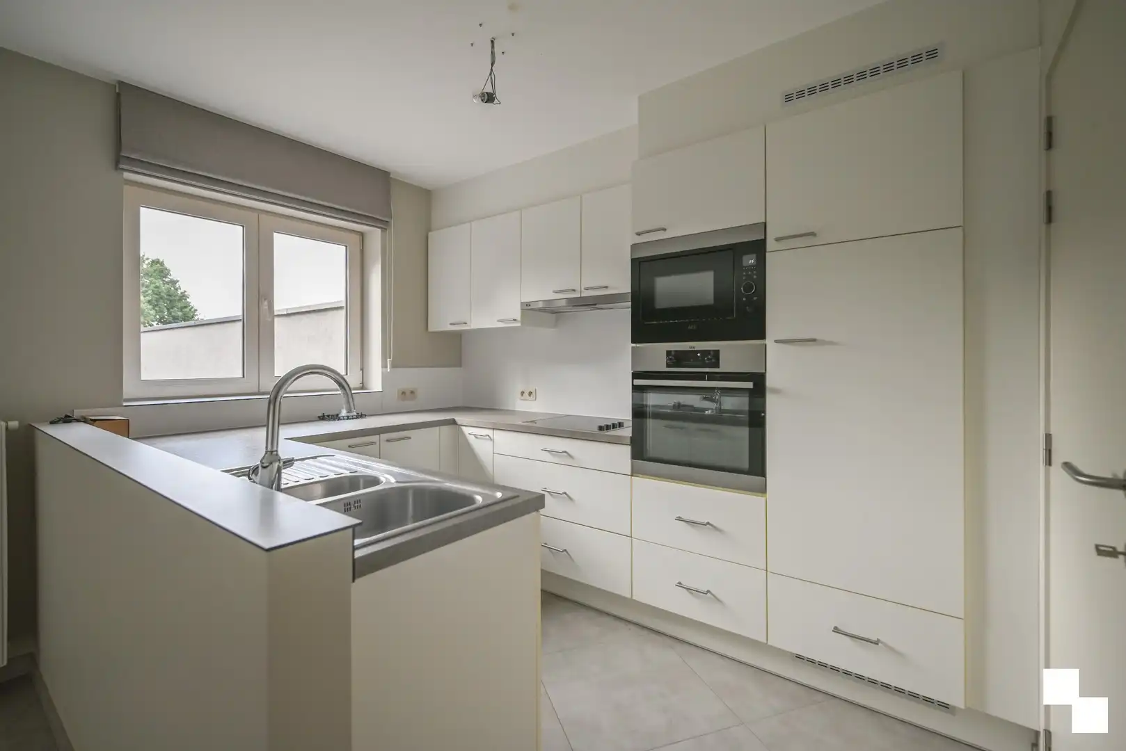 Appartement met ruim terras in het centrum van Kachtem foto 12