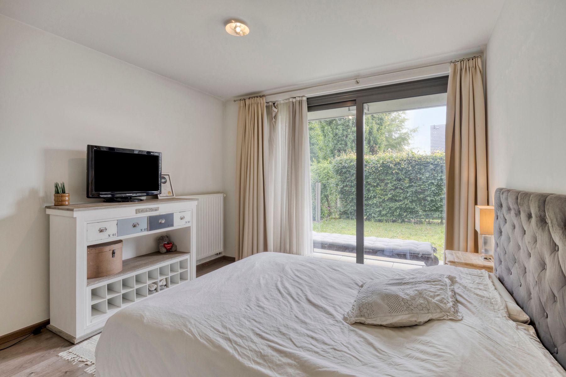 Ruim gelijkvloersappartement met tuin en garage foto 12